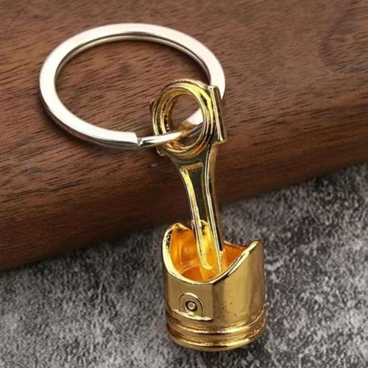 Gold Car Engine Piston Keychain