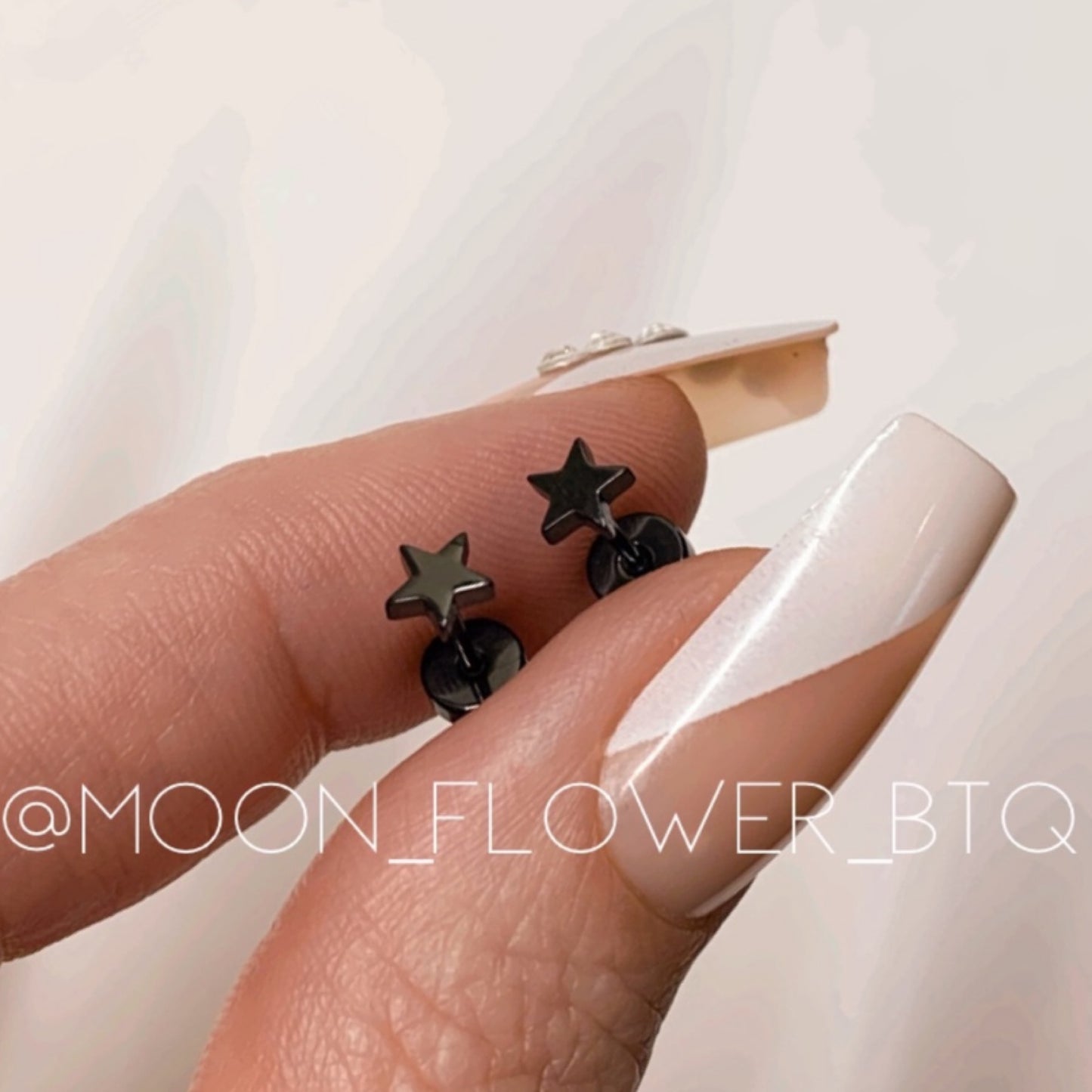 Tiny Black Star Earrings